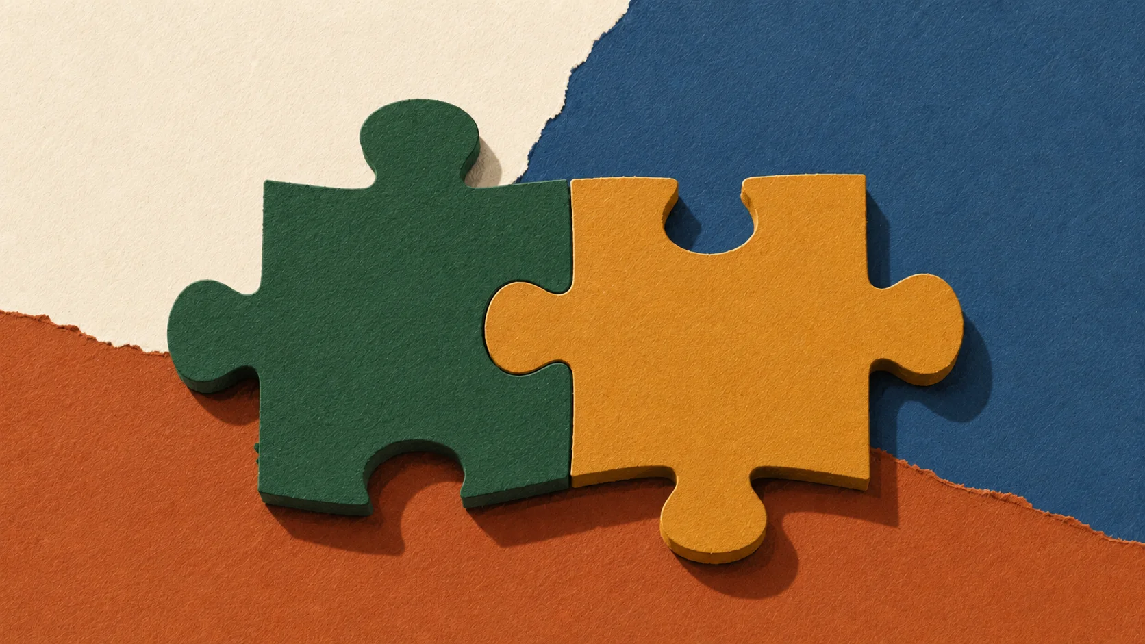 A cut-paper collage of two carved wooden puzzle pieces fitted together.